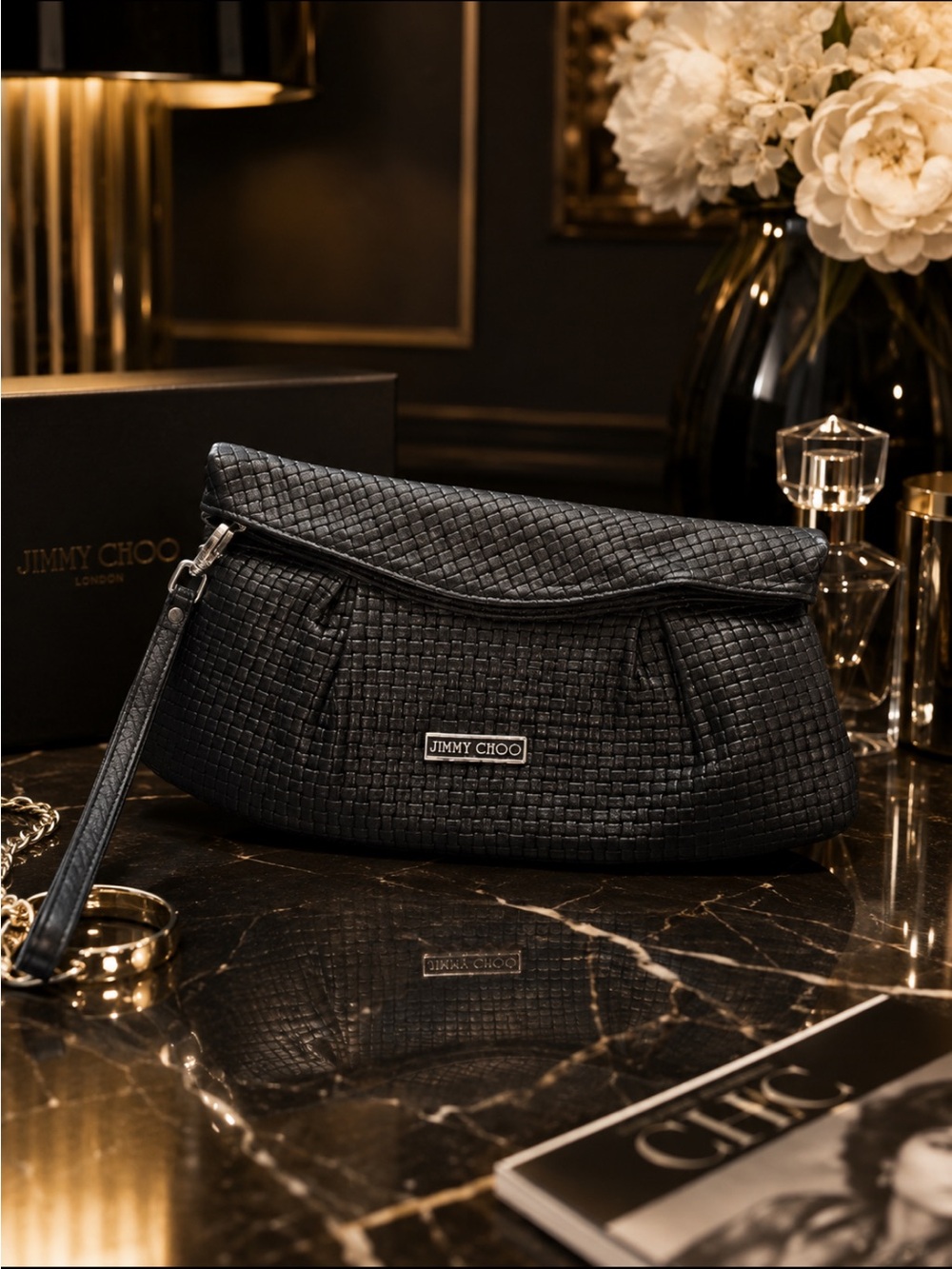 JIMMY CHOO breaded leather wristlet!
